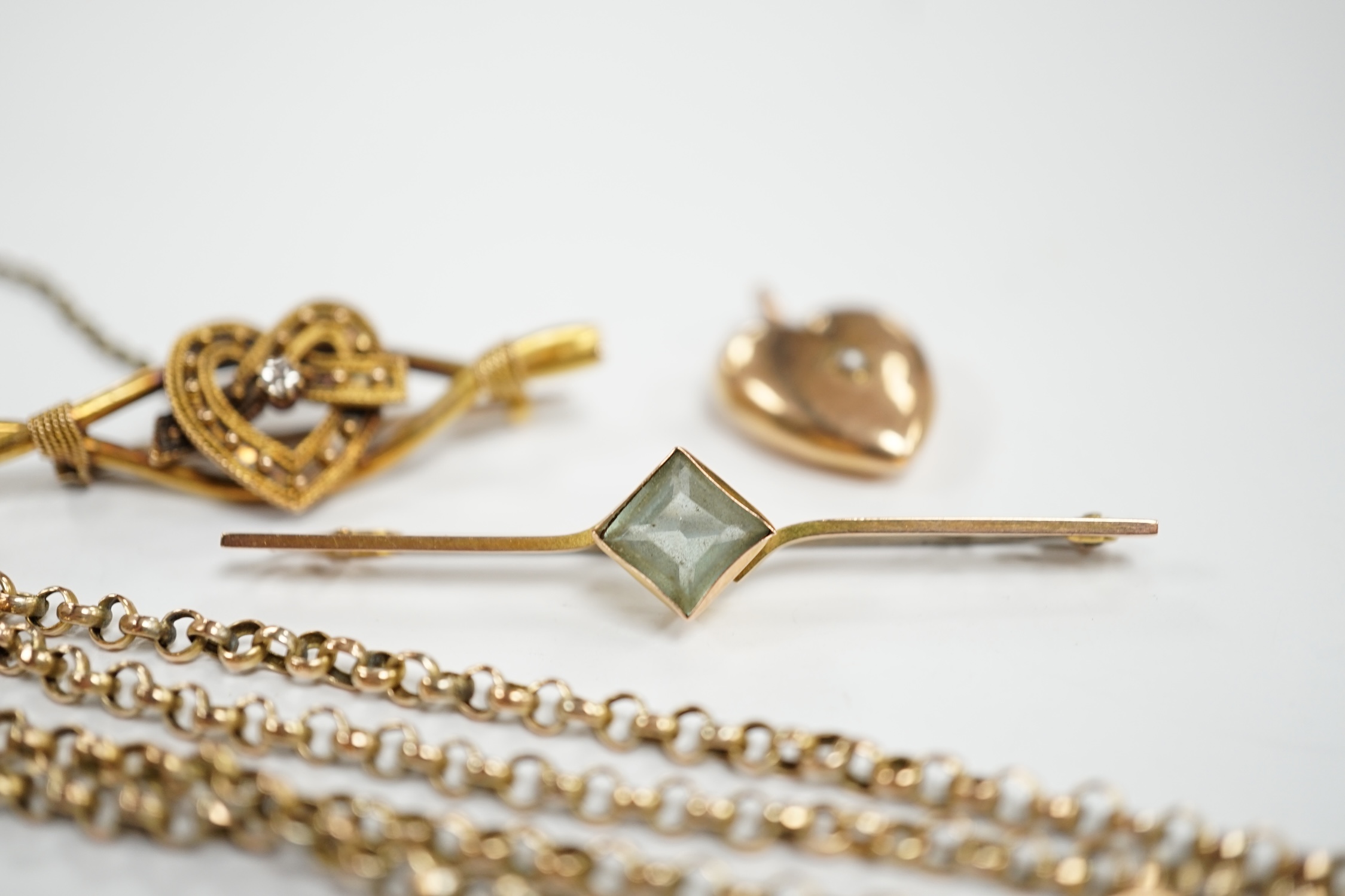 A 9ct chain, 42cm, a 15ct and diamond set heart shaped bar brooch, a 9ct and gem set bar brooch and a 9ct and seed pearl set heart shaped pendant.